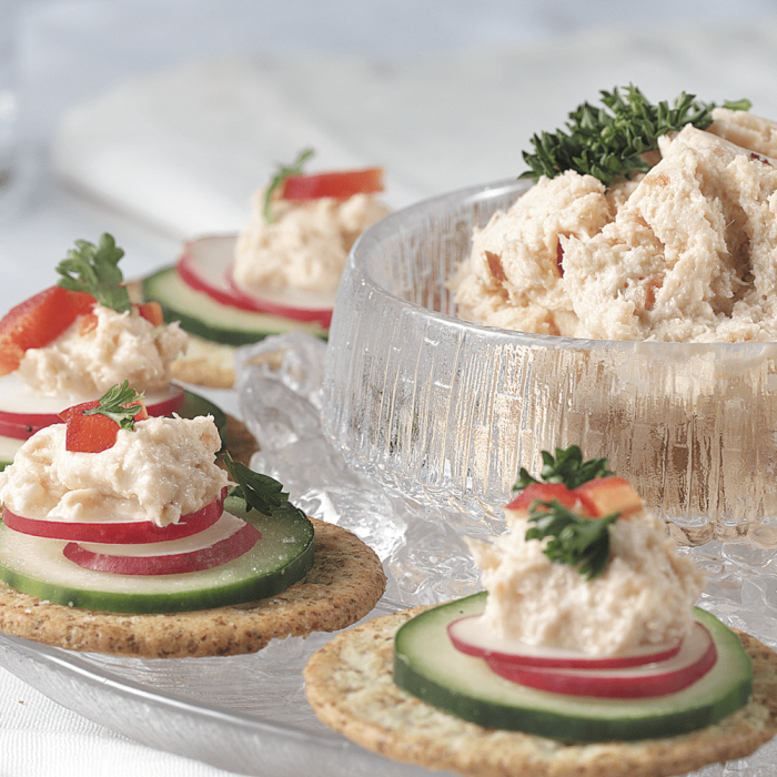 A container of smoked salmon spread.