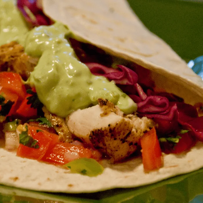 A fresh, raw Mahi Mahi fish ready for cooking.