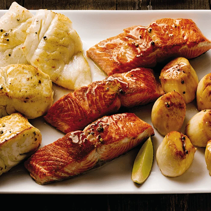 A variety pack of Alaskan Harvest Fish including different types of freshly caught fish, neatly packaged and ready for consumption.