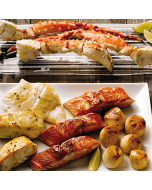 A variety pack of Alaskan Harvest seafood, including various types of wild-caught fish and shellfish.