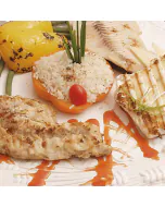 A variety of fresh whitefish including Black Cod, Halibut, and Rockfish, presented as a sampler pack.