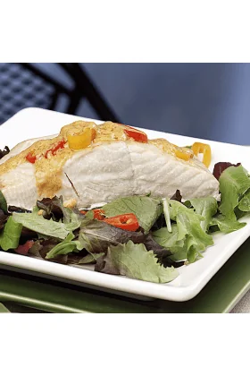 Fresh, raw Ivory King Salmon fillets displayed on a clean surface.