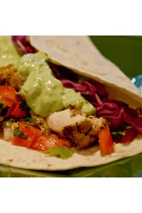 A fresh, raw Mahi Mahi fish ready for cooking.
