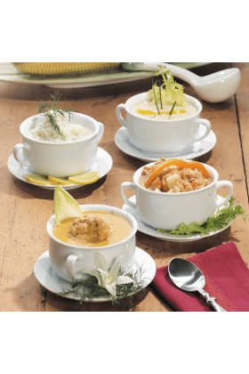 Four different types of soup served in individual bowls, arranged together for a diverse meal option.