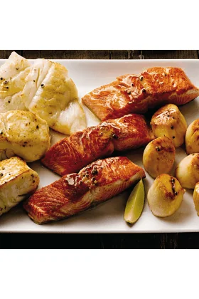 A variety pack of Alaskan Harvest Fish including different types of freshly caught fish, neatly packaged and ready for consumption.