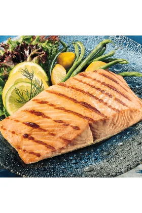 16 pieces of King salmon fillets neatly arranged in a display.